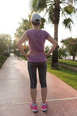 Image showing woman  stretching before morning jogging