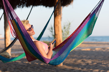 Image showing relaxed woman laying in hammock