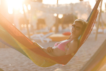 Image showing relaxed woman laying in hammock