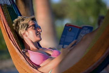 Image showing relaxed woman laying in hammock