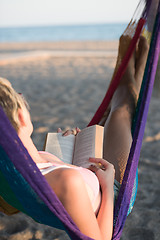 Image showing relaxed woman laying in hammock