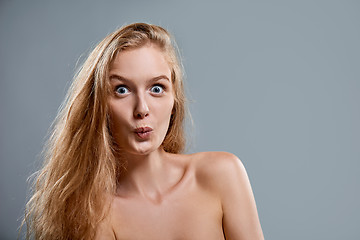 Image showing Closeup of woman playfully making funny face