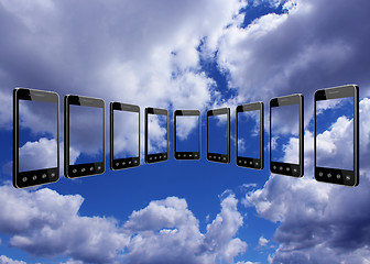 Image showing smart-phones transparent on the blue sky