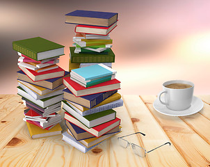 Image showing The piles of books and notebooks on a wooden table.