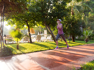 Image showing sporty woman jogging