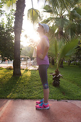 Image showing woman  stretching before morning jogging