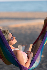 Image showing relaxed woman laying in hammock