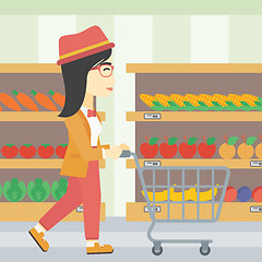 Image showing Customer with shopping cart vector illustration.