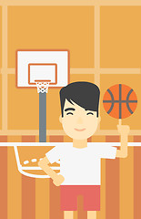 Image showing Basketball player spinning ball.