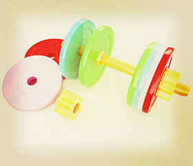 Image showing Colorful dumbbells are assembly and disassembly on a white backg