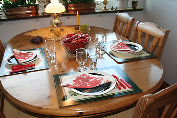 Image showing Laid table with crayfish