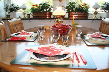 Image showing Laid table with crayfish