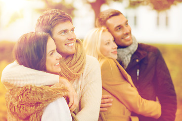 Image showing group of friends having fun in autumn park