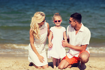 Image showing happy family in sunglasses on summer beach