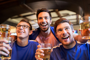 Image showing football fans or friends with beer at sport bar