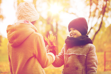 Image showing smiling children in autumn park