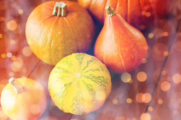 Image showing close up of pumpkins on wooden table at home