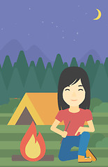 Image showing Woman kindling campfire vector illustration.