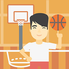 Image showing Basketball player spinning ball.