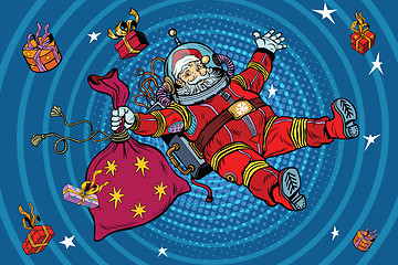 Image showing Space Santa Claus in zero gravity with Christmas gifts