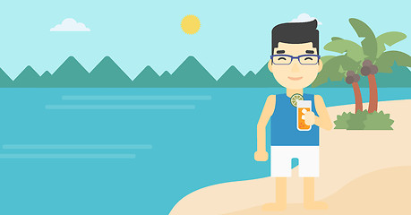 Image showing Man with cocktail on the beach.