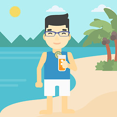 Image showing Man with cocktail on the beach.