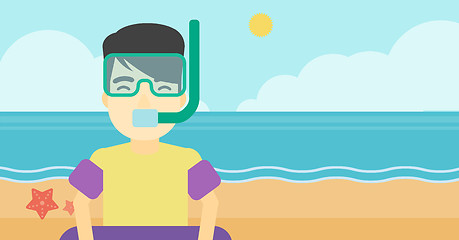 Image showing Man with snorkeling equipment on the beach.