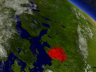 Image showing Lithuania from space highlighted in red