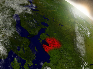 Image showing Latvia from space highlighted in red