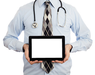 Image showing Doctor holding tablet with copy space and clipping path for the 