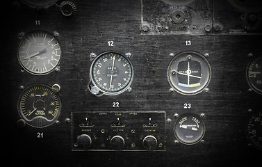 Image showing Different meters and displays in an old plane