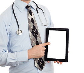 Image showing Doctor holding tablet with copy space and clipping path for the 