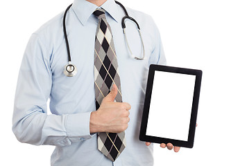 Image showing Doctor holding tablet with copy space and clipping path for the 