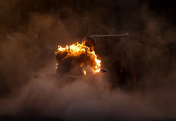 Image showing fiery rider a quad bike