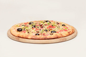 Image showing Tasty pizza with vegetables, chicken and olives isolated on white