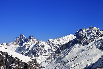 Image showing Winter mountain peaks at sunny day
