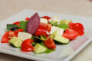 Image showing fresh vegetable salad isolated on white background