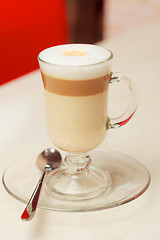 Image showing coffee latte in glass cup on table