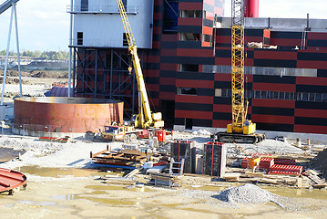 Image showing cranes and chinmey on construction of industrial factory