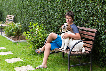 Image showing Happy young Boy and his dog