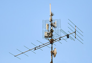 Image showing antenna and wi-fi transmitter on the roof