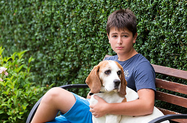 Image showing Happy young Boy and his dog