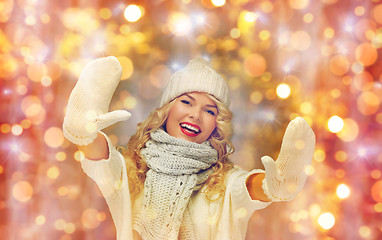 Image showing beautiful woman in winter hat, scarf and mittens