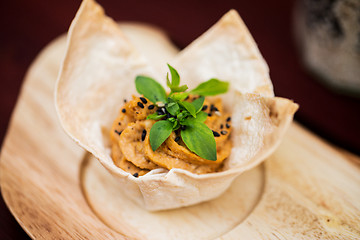 Image showing close up of dough cornet with filling