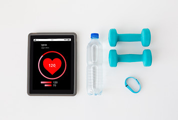 Image showing tablet pc, dumbbells, fitness tracker and bottle