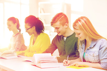 Image showing students with textbooks and books at school