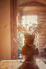 Image showing wheats and old jug