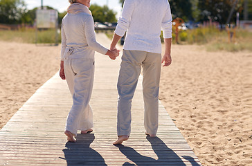 Image showing close up of senior couple on summer beach