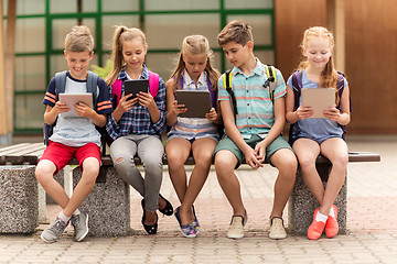 Image showing group of happy elementary school students talking