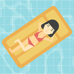 Image showing Woman relaxing in swimming pool.